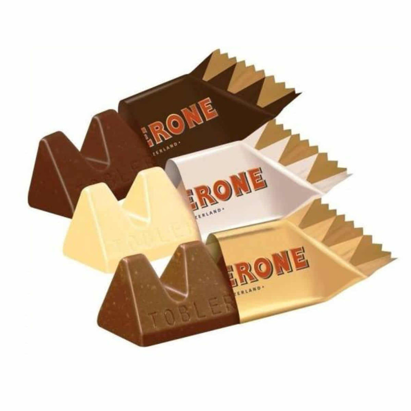 Chocolatinas mini Toblerone de chocolate con leche, blanco y negro sin envolver