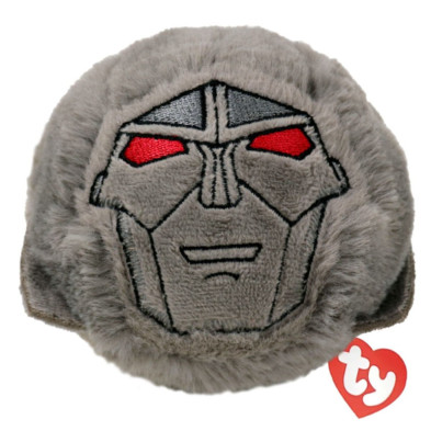 detalle del peluche redondo Megatron Transformers Ty con cara bordada y etiqueta roja ty